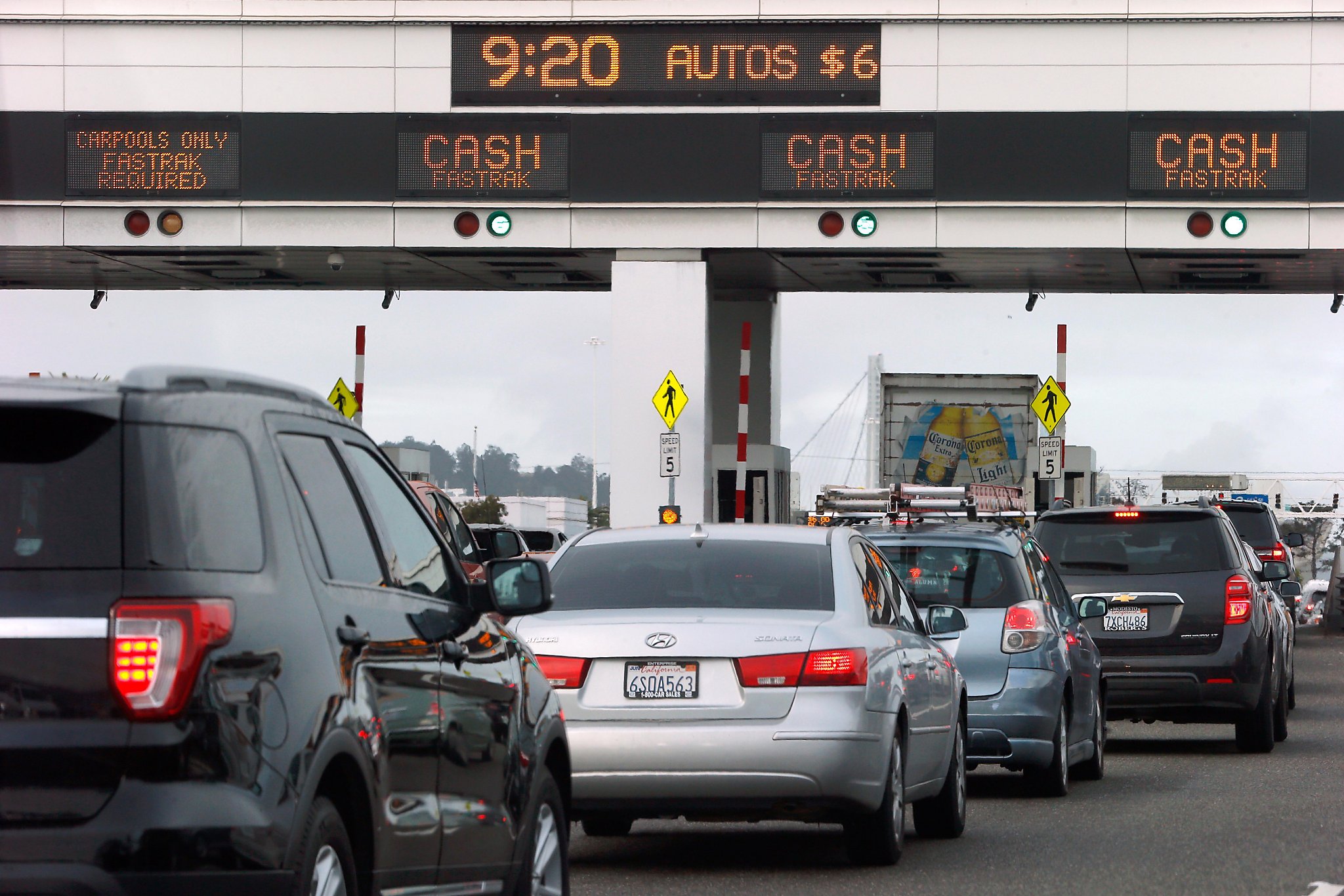 Plan to free bay bridges from cash tolls will save money. But how much?