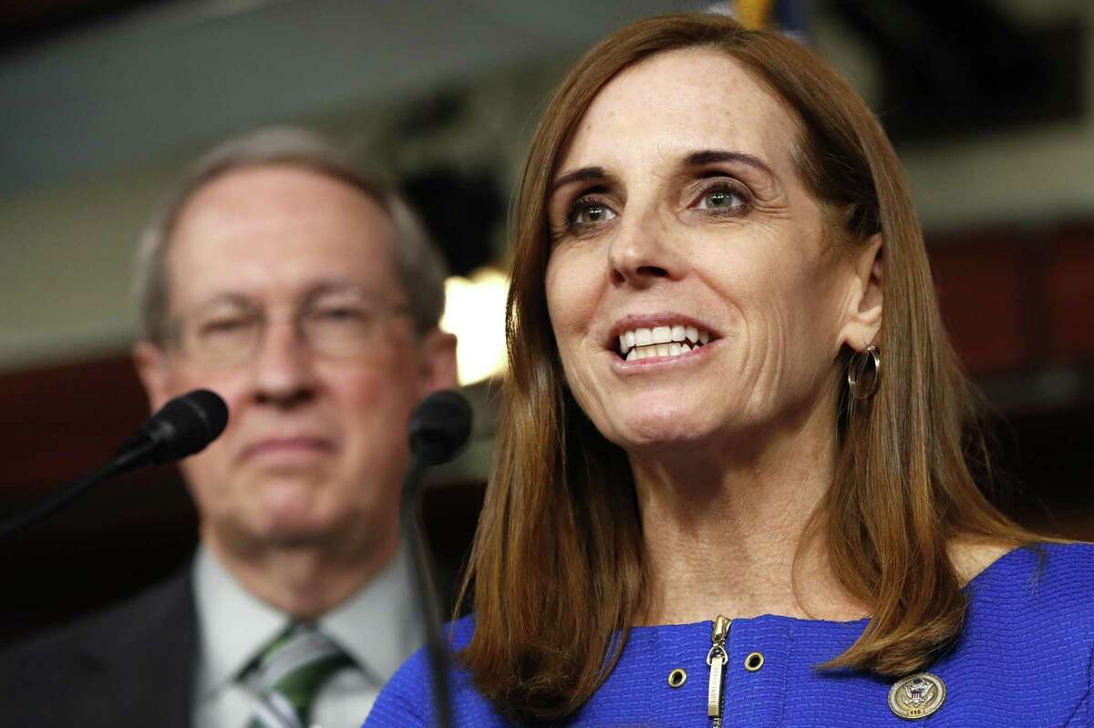 House Homeland Security Border and Maritime Security Subcommittee Chairwoman Rep. Martha McSally, R-Ariz., right, speaks during a news conference with House Judiciary Committee Chairman Rep. Bob Goodlatte, R-Va., Wednesday, Jan. 10, 2018, on Capitol Hill in Washington. The news conference was to announce their immigration bill that would impact recipients of the Deferred Action for Childhood Arrivals (DACA) program. (AP Photo/Jacquelyn Martin)