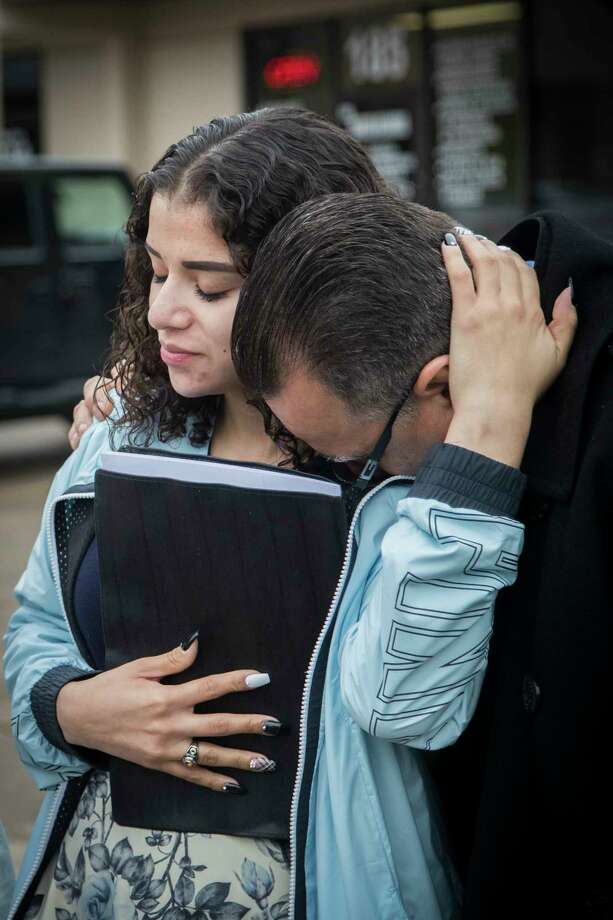 Juan Rodriguez rests his head on his daughter Karen Rodriguez's shoulder relieved that he got another 30-day extension to stay in the United States with his family as his immigration case goes to be reviewed by an immigration board. Wednesday, Jan. 10, 2018, in Houston. ( Marie D. De Jesus / Houston Chronicle ) Photo: Marie D. De Jesus, Houston Chronicle / © 2018 Houston Chronicle