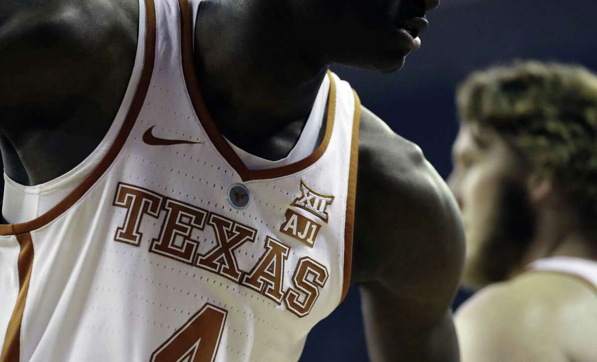 Texas’ Mohamed Bamba wears an "AJ1" patch to show support for teammate Andrew Jones, who is battling leukemia.