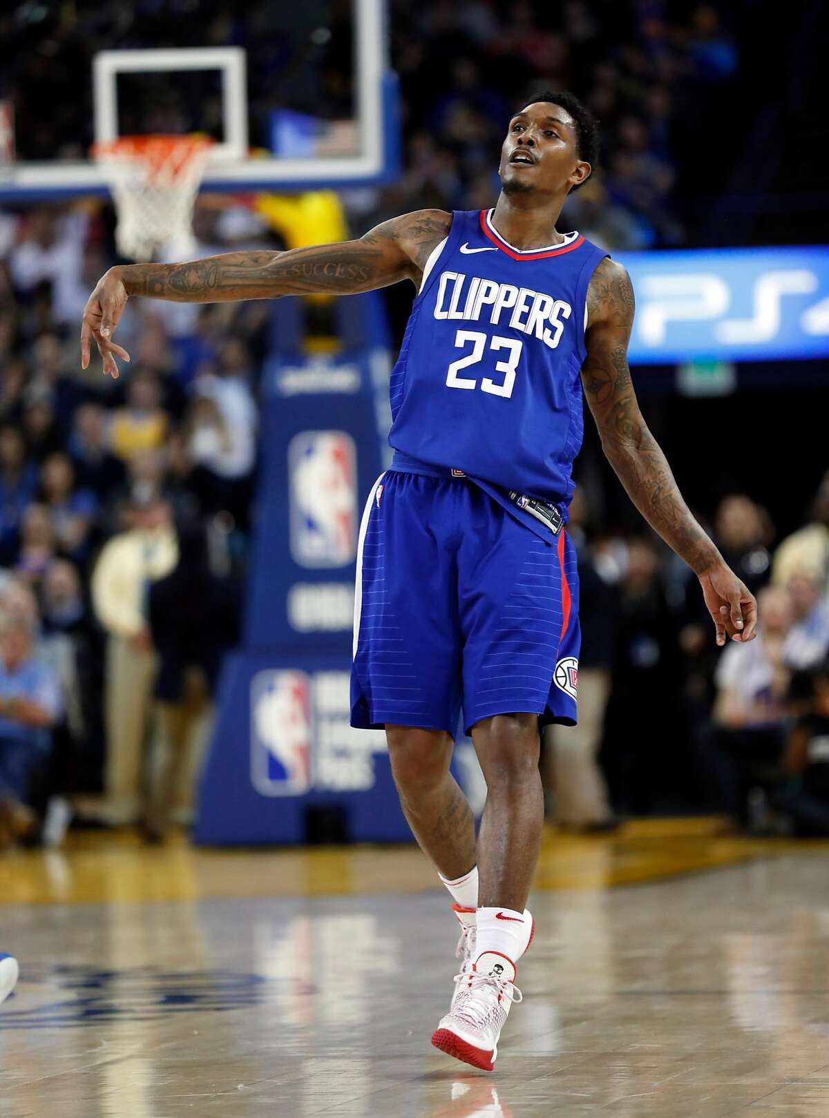 Los Angeles Clippers' Lou Williams watches his successful 3-pointer in 3rd quarter of Clippers' 125-106 win over Golden State Warriors in NBA game at Oracle Arena in Oakland, Calif., on Wednesday, January 10, 2018.