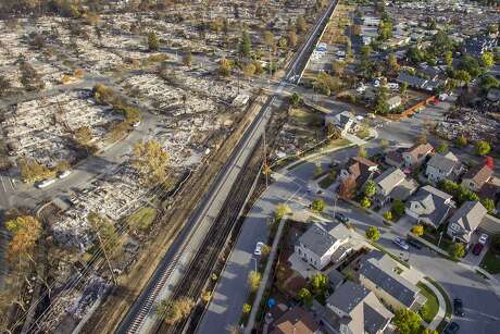 The Coffey Lane neighborhood is devastated by the Tubbs Fire as the neighborhood off of Gold Leaf Lane is seen with only some damage from the Tubbs Fire, Friday, Oct. 20, 2017, in Santa Rosa, Calif.