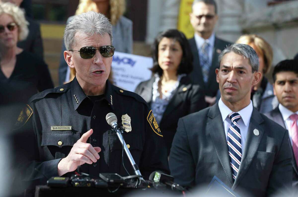 San Antonio Police Chief William McManus and Mayor Ron Nirenberg address the media in 2018 during a press conference about human trafficking. A reader questions rethinking police funding.