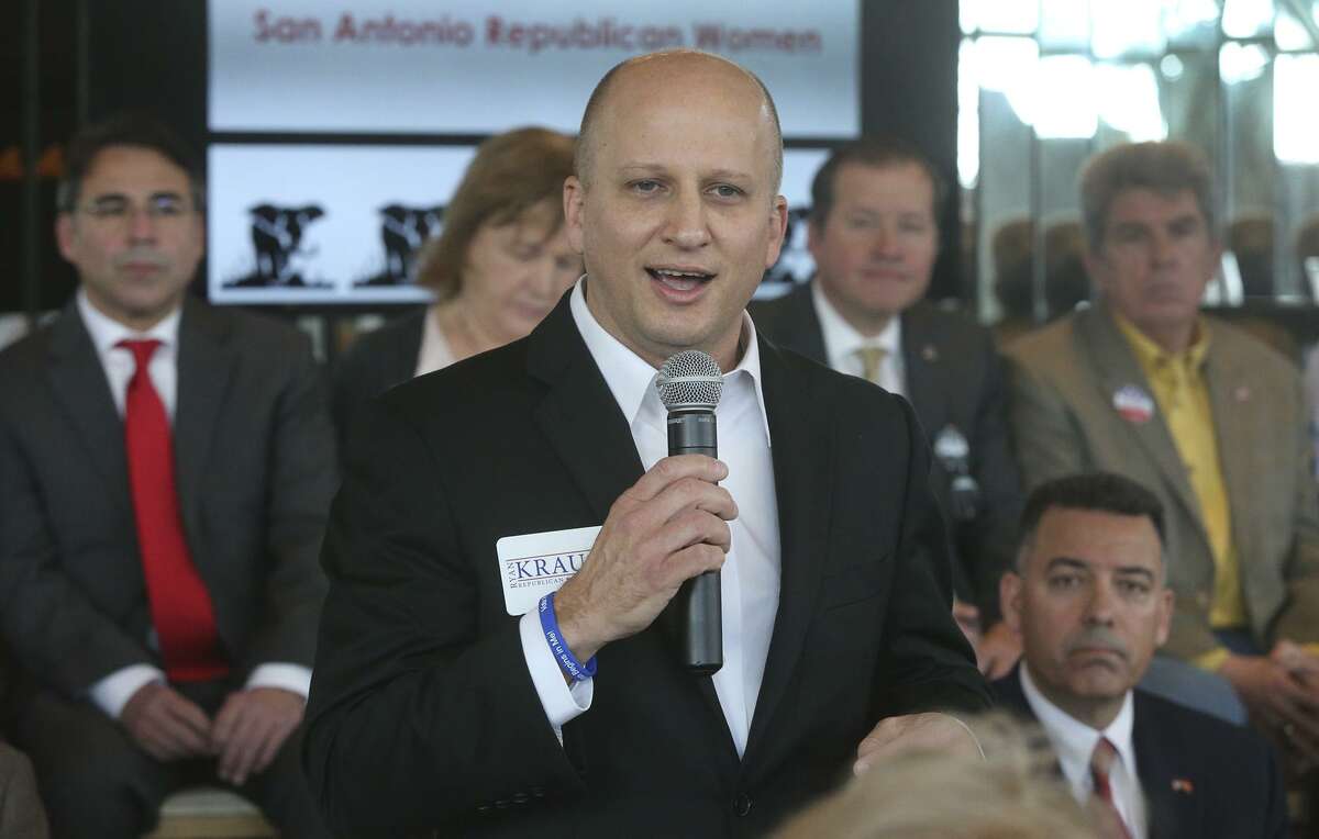 Congressional District 21 candidate Ryan Krause (foreground, holding microphone) speaks Thursday January 11, 2018 at the Old San Francisco Steakhouse during a forum held during a meeting of the San Antonio Republican Women. The forum introduced 15 candidates running for the seat held in Congressional District 21 held by Representative Lamar Smith.