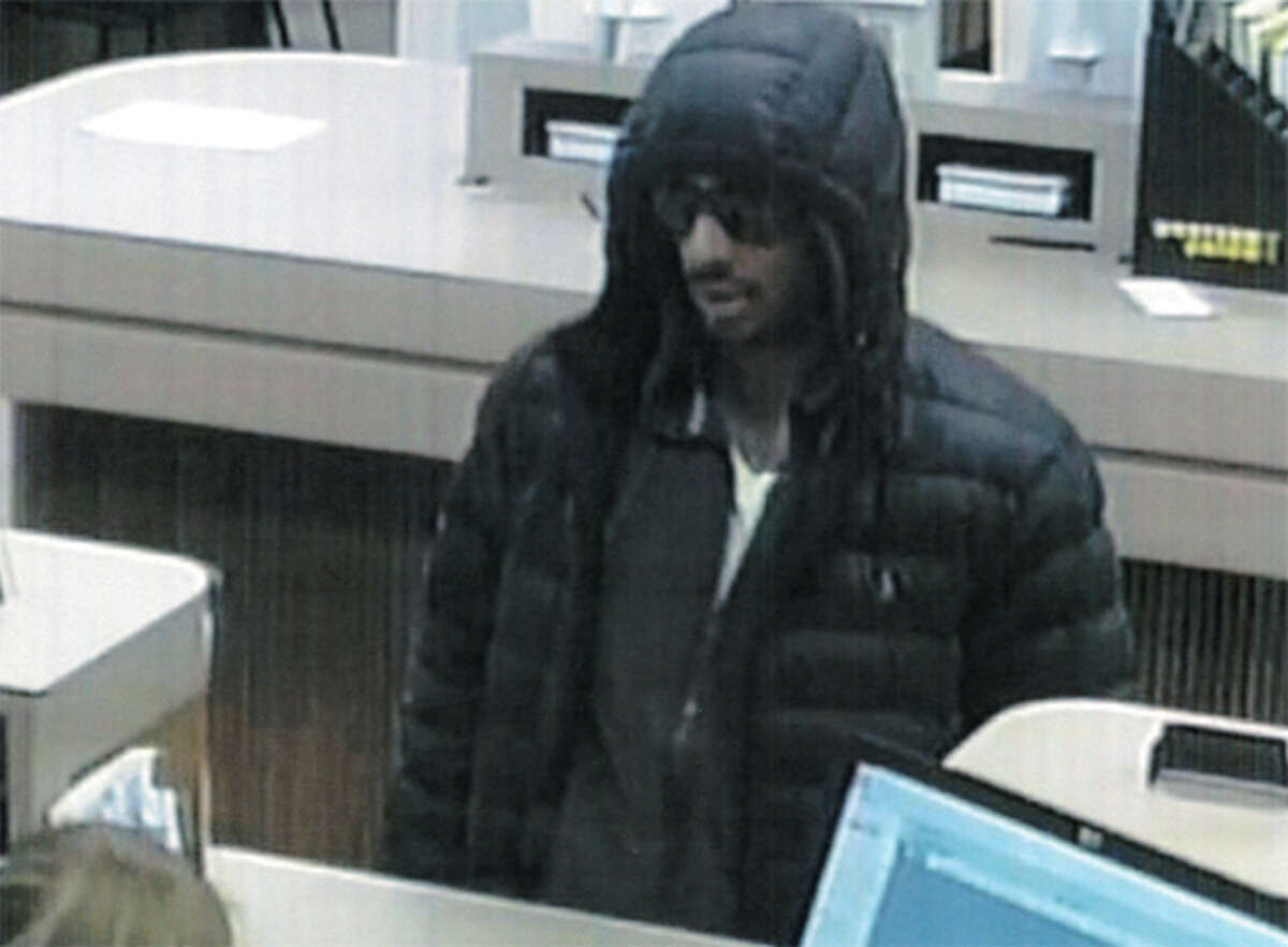 Pictured is the suspect in a surveillance photo from the Nov. 29 robbery in Alton.
