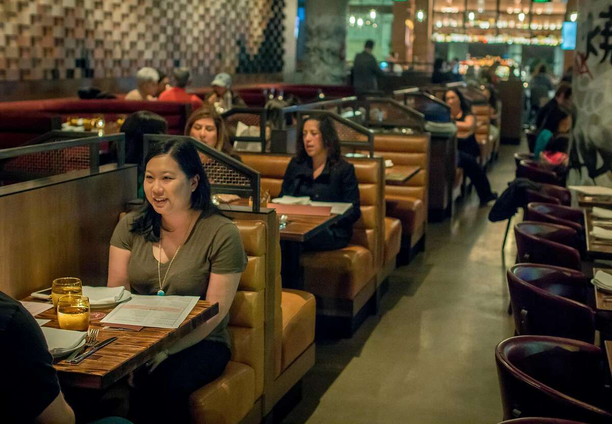 People have dinner at International Smoke in San Francisco, Calif. on January 6th, 2018.