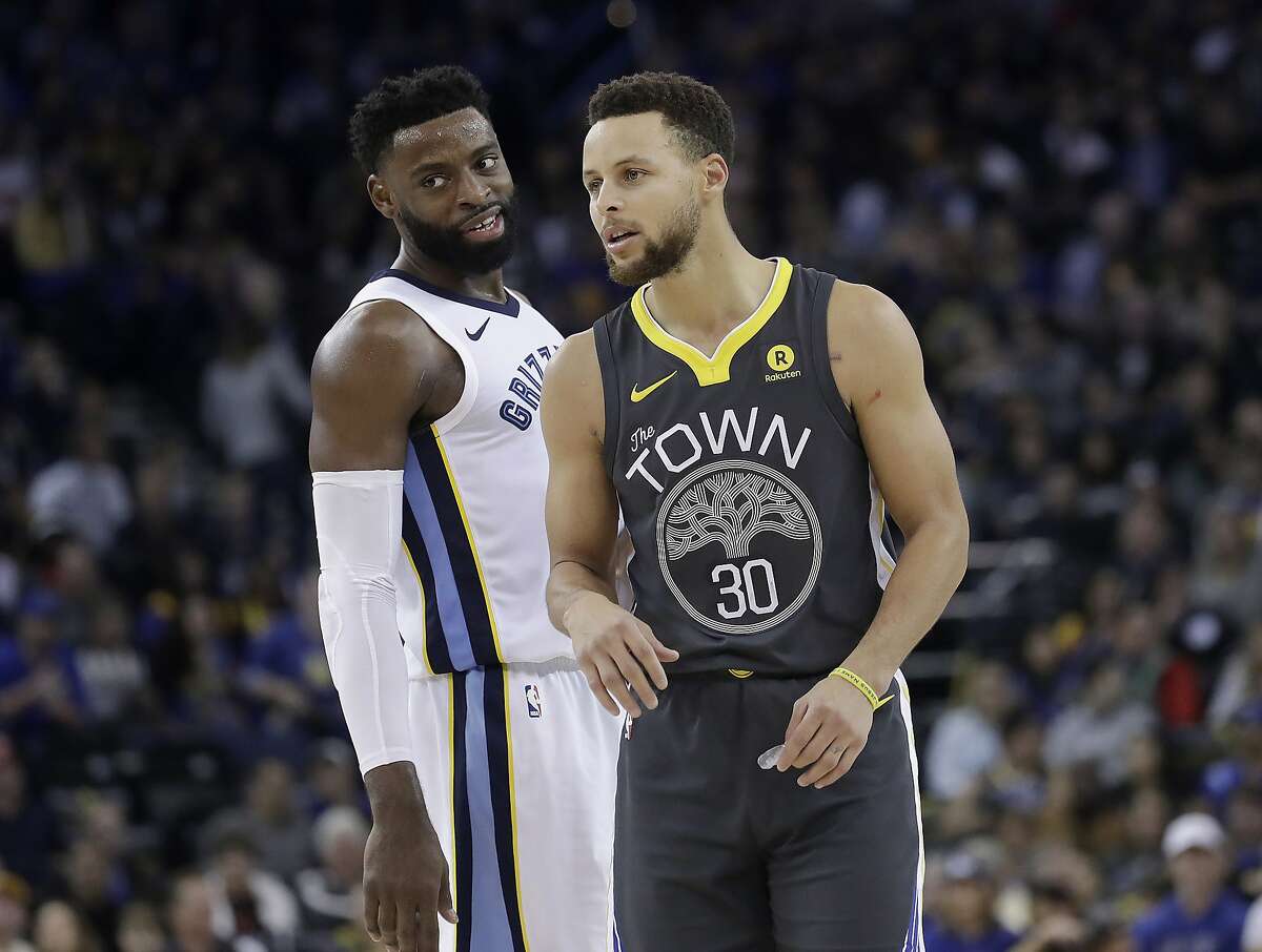 Warriors guard Stephen Curry (30) talks with Memphis Grizzlies guard Tyreke Evans on Saturday, Dec. 30, 2017. Keep clicking for the best available NBA free agents.