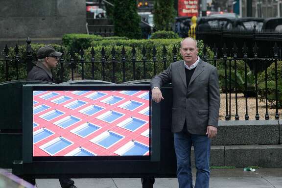 Bob Schmitt,  regional president, Northern California, Clear Channel Outdoor Americas, stands next to a digital urban panel for a portrait on Monday, January 8, 2018 in San Francisco, Calif.