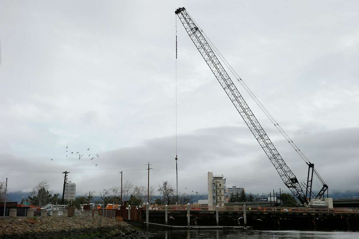 The Embarcadero Bridge construction site, Tuesday, Jan. 9, 2018, in Oakland, Calif. The bridge over the Lake Merritt Channel, between Oak Street and 5th Avenue, is being replaced by a new and seismically safer structure with enhanced pedestrian and bicycle access.