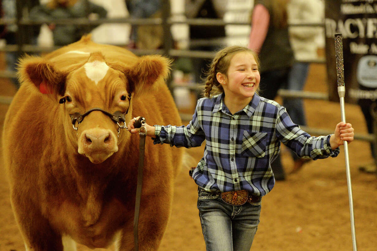Kimbre Lambert reacts as her steer "Big Dawg" is announced reserve champion during the Midland County Livestock Association annual show Jan. 12, 2018. James Durbin/Reporter-Telegram