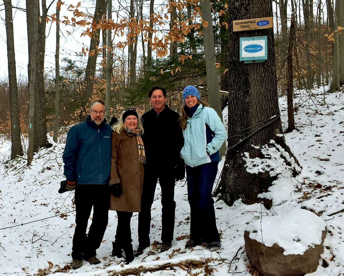 Hamden Land Conservation Trust President Jim Sirch, Rocky Top neighbors Roberta Mack and Tim Mack and Connecticut Forest and Park Association Land Conservation Director Lindsay Suhr