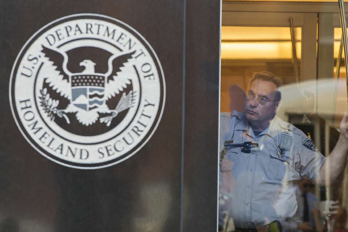 Feds investigate child porn and arrest two of their own