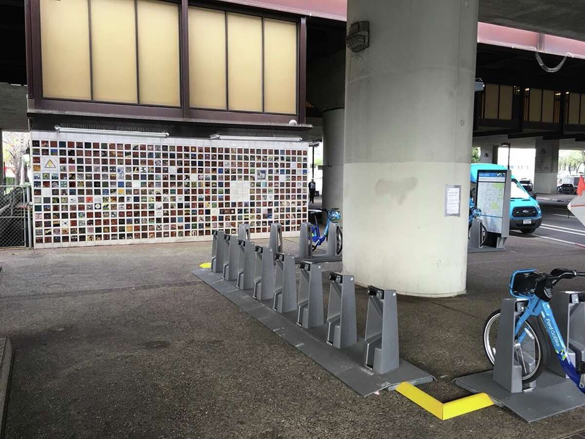 Oakland officials said they are looking for a new location for a Ford GoBike docking station after residents expressed outrage over its proximity to an Oakland firestorm memorial.