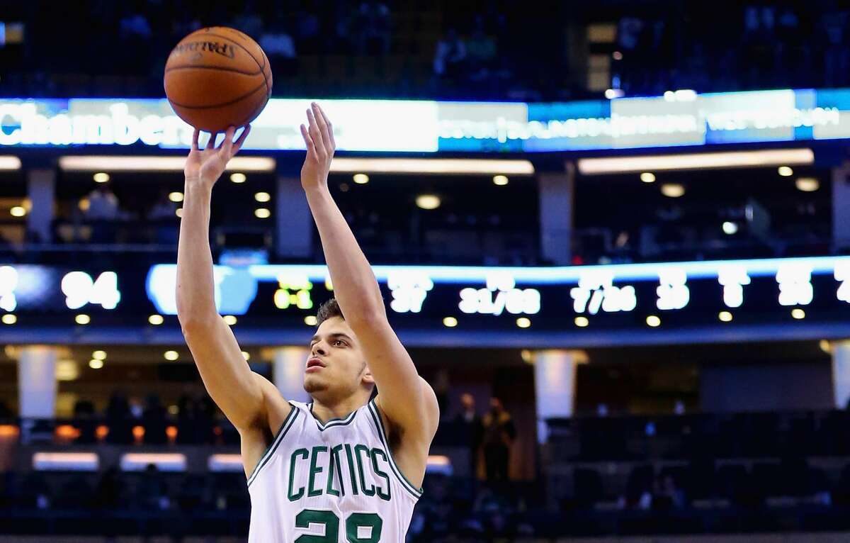 BOSTON, MA - MARCH 09: R.J. Hunter #28 of the Boston Celtics hits a three point shot during the fourth quarter against the Memphis Grizzlies at TD Garden on March 9, 2016 in Boston, Massachusetts. The Celtics defeat the Grizzlies 116-96. NOTE TO USER: User expressly acknowledges and agrees that, by downloading and/or using this photograph, user is consenting to the terms and conditions of the Getty Images License Agreement. (Photo by Maddie Meyer/Getty Images)