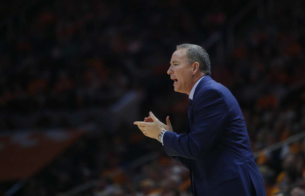 Texas A&M head coach Billy Kennedy claps for his team in the second half of an NCAA college basketball game against Tennessee on Saturday, Jan. 13, 2018, in Knoxville, Tenn. (AP Photo/Crystal LoGiudice)