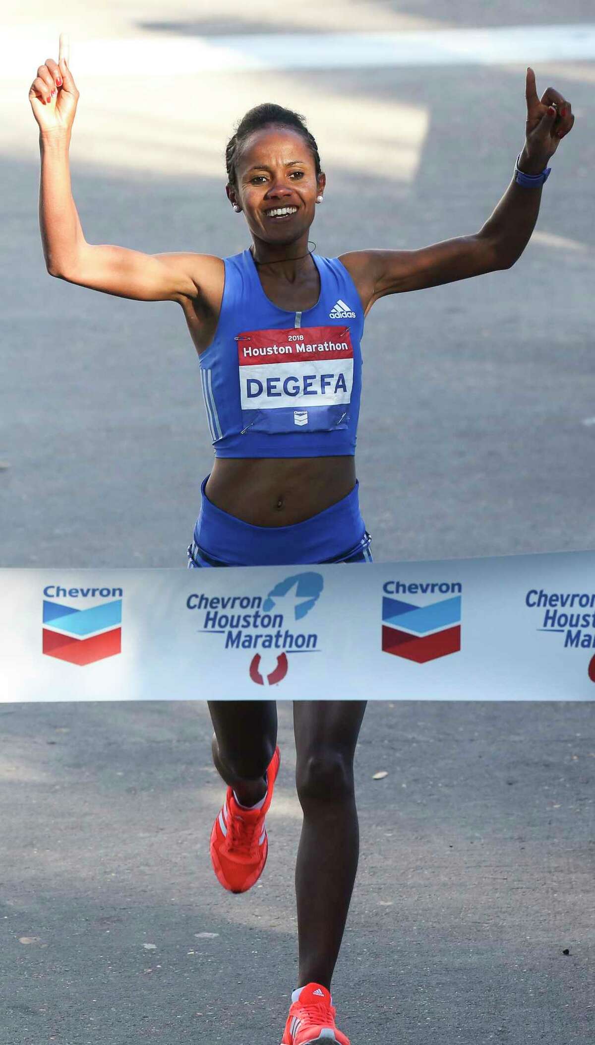 For Houston Marathon women's champ, wedded bliss extends to race