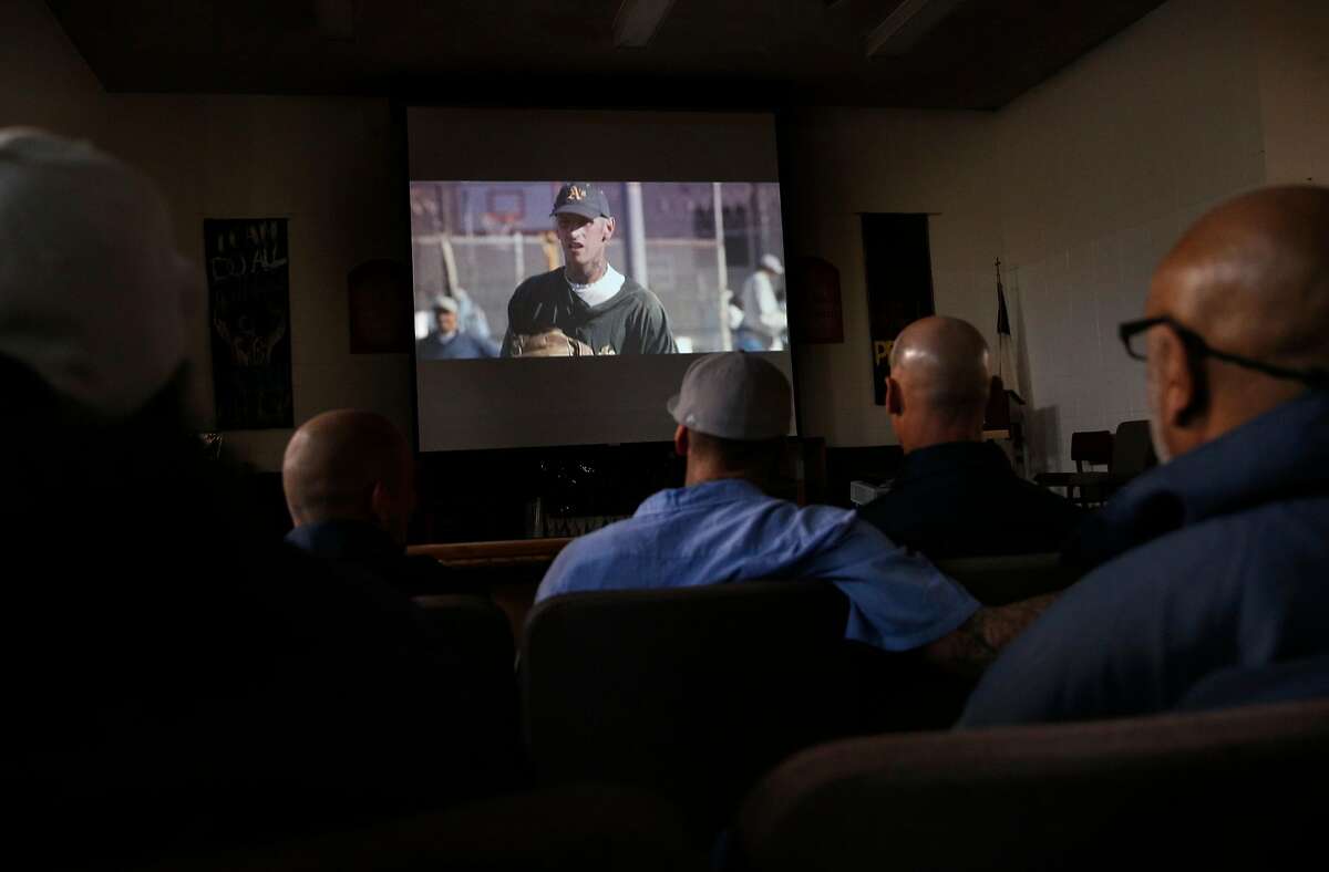 Inmates and guests gather for the screening of "Through the Darkness" a documentary about the San Quentin Baseball program at San Quentin Prison in San Rafael, Calif., on Tues. January 9, 2018.