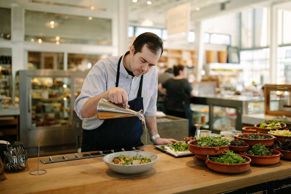 Perry Hoffman prepares a salad with local and in season ingredients at the Shed in Healdsburg, Calif. Saturday, Jan. 6, 2018.