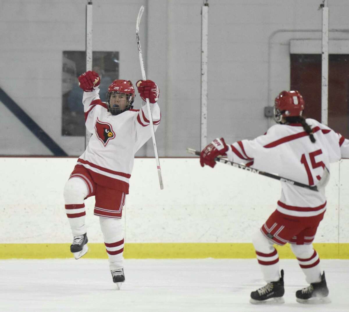 Greenwich’sJen Kelly, left, celebrates her goal with teammate Katie Piotrzkowski on Monday at Dorothy Hamill Skating Rink in Greenwich.