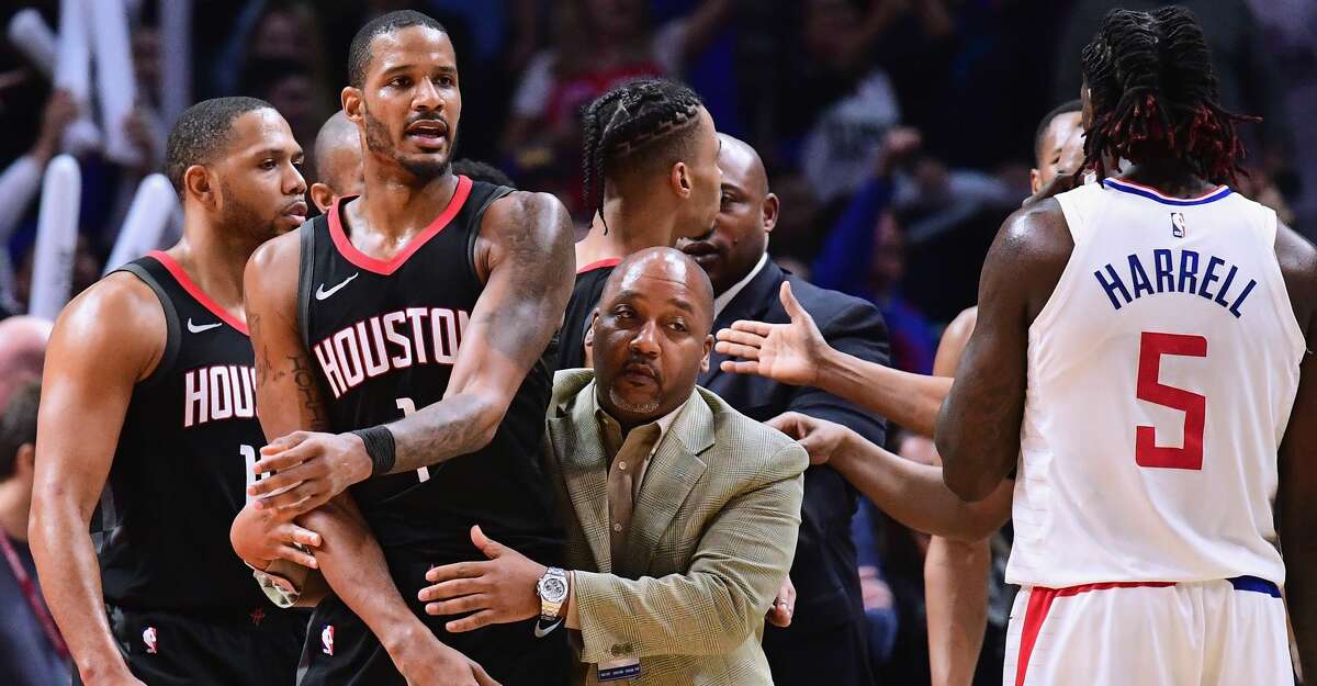 LOS ANGELES, CA - JANUARY 15: Trevor Ariza #1 of the Houston Rockets is restrained by an assistant coach before his ejection from the game during a 113-102 LA Clippers win at Staples Center on January 15, 2018 in Los Angeles, California. (Photo by Harry How/Getty Images)