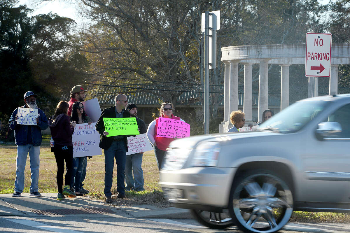 Protesters gather near the Confederate Memorial of the Wind on Martin Luther King Jr. Drive in Orange on Monday afternoon. Photo taken Monday 1/15/18 Ryan Pelham/The Enterprise