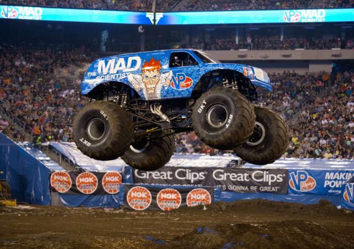 Monster truck Mad Scientist forward rolling into San Antonio