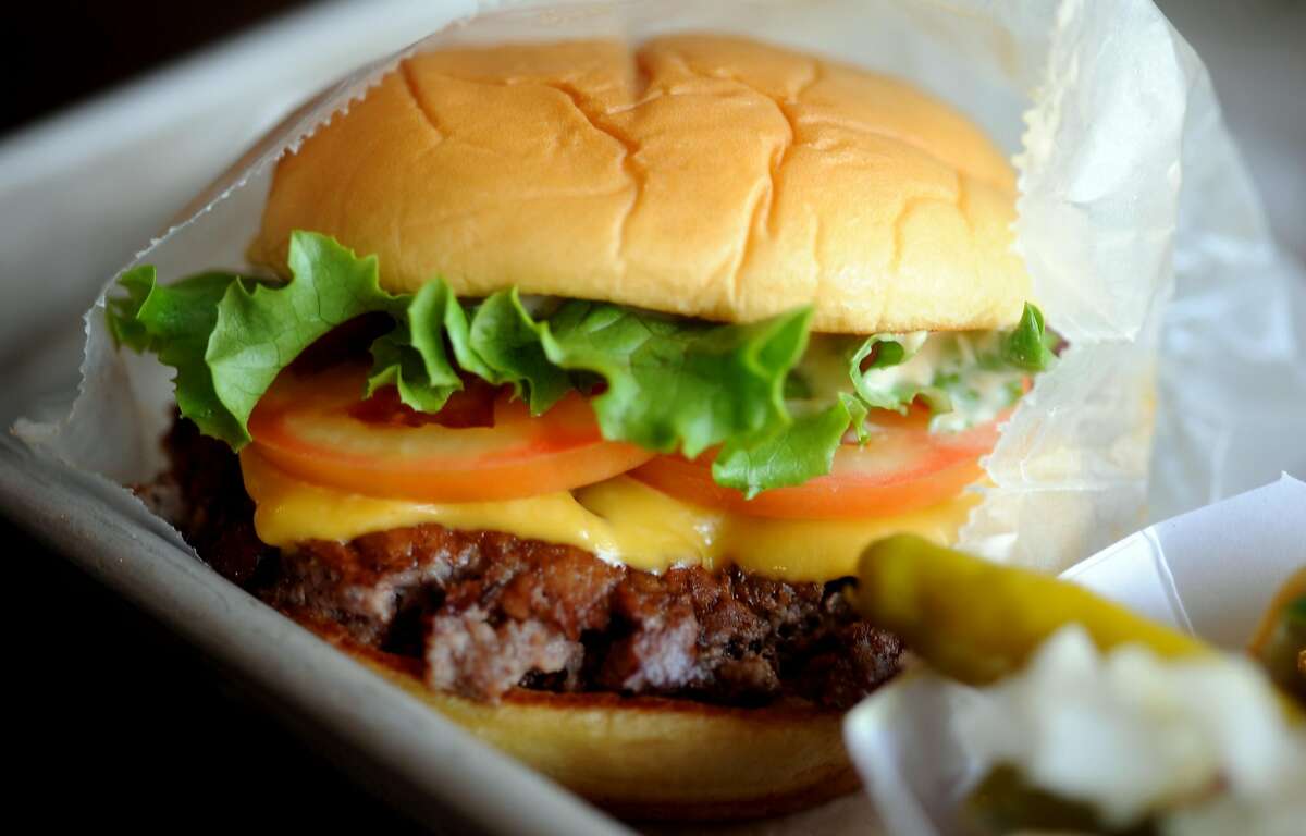 The ShackBurger, with American cheese, lettuce, tomato and ShackSauce, at Shake Shack's newest location in Westport, Conn.