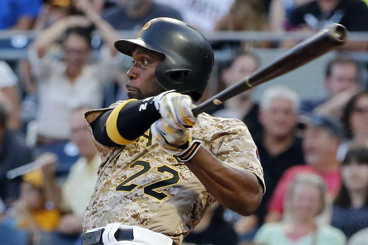 FILE - In this Aug. 3, 2017, file photo, Pittsburgh Pirates' Andrew McCutchen watches his RBI-single off Cincinnati Reds starting pitcher Sal Romano during the third inning of a baseball game in Pittsburgh. The Giants acquired McCutchen from the Pirates for right-hander Kyle Crick, minor league outfielder Bryan Reynolds and $500,000 in international signing bonus allocation. (AP Photo/Gene J. Puskar, File)
