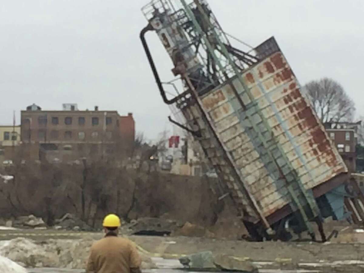 silo falls on tractor during demo