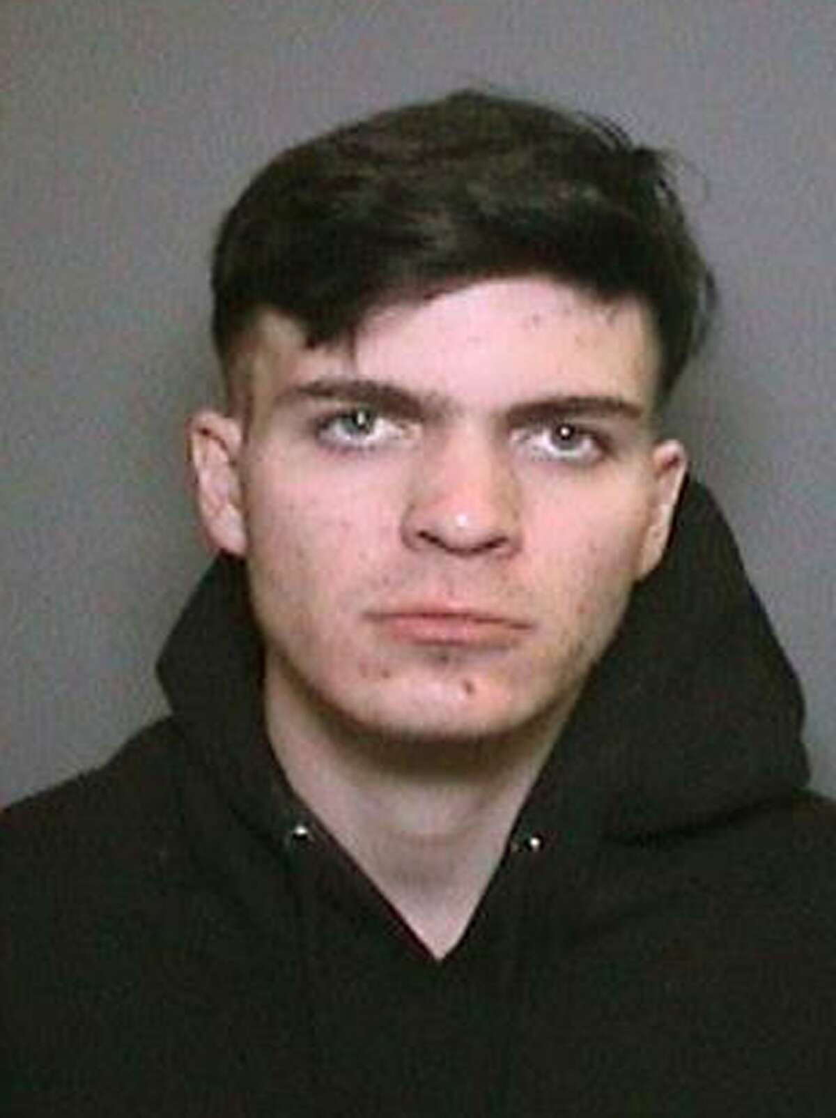 This Friday, Jan. 12, 2018 booking photo provided by the Orange County, Calif., Sheriff's Department shows Samuel Lincoln Woodward, 20. Authorities arrested Woodward, described as a friend of Blaze Bernstein, in the killing of the 19-year-old University of Pennsylvania student found buried Jan. 8, in a shallow grave at a park in Lake Forest, Calif. Undersheriff Don Barnes says DNA evidence links Woodward to the crime. (Orange County Sheriff's Department via AP)