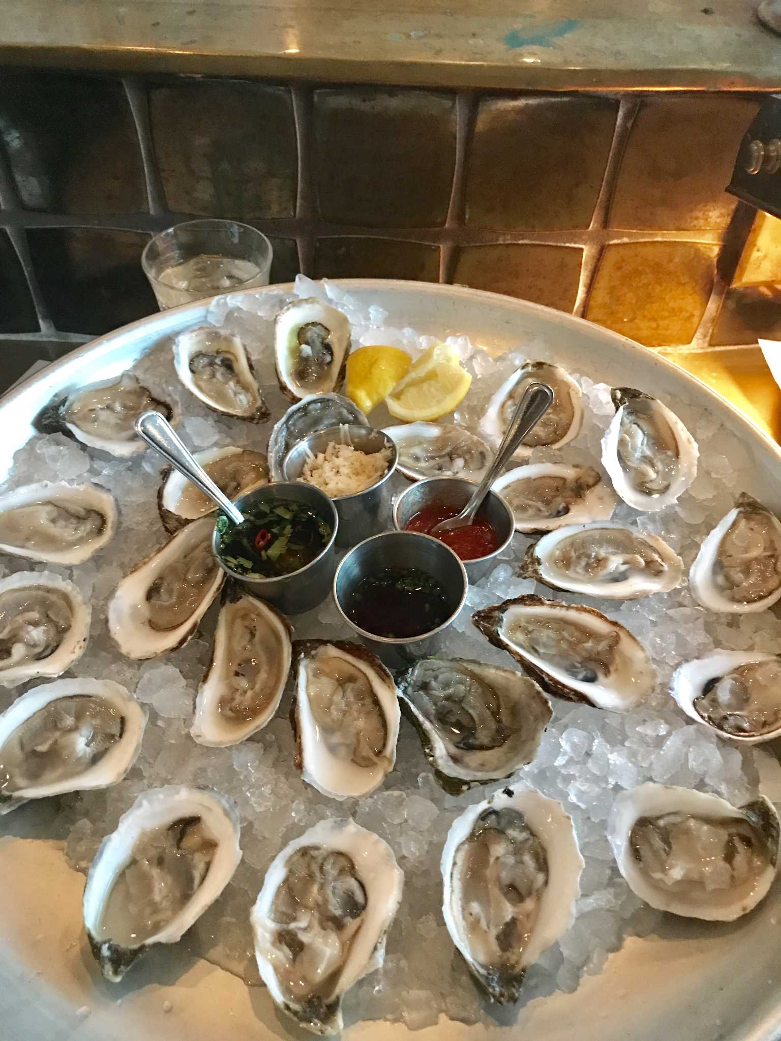 Eat This: Oyster Happy Hour at State of Grace - Houston Chronicle
