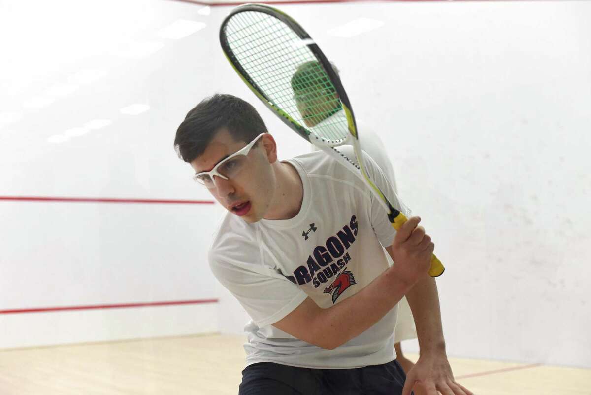 Duda Voldman of Greens Farms Academey hits a return during his team's match against Rye Country Day last week.