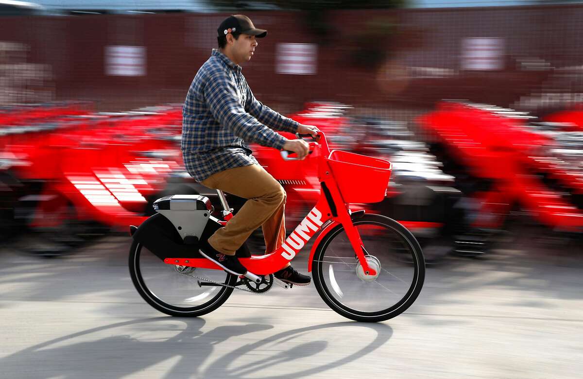Gavin Callies test rides a Jump e-assist bicycle after final assembly in San Francisco, Calif. on Wednesday, Jan. 17, 2018. Jump is deploying 250 of the bike-share electric bicycles on the streets of the city Thursday and have plans to add another 250 to the fleet later in the year.