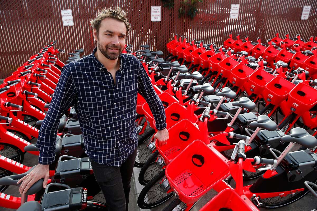Jump Bikes founder and CEO Ryan Rzepecki is seen with e-assist bicycles that are ready to roll in San Francisco, Calif. on Wednesday, Jan. 17, 2018. Jump is deploying 250 of the bike-share electric bicycles on the streets of the city Thursday and have plans to add another 250 to the fleet later in the year.