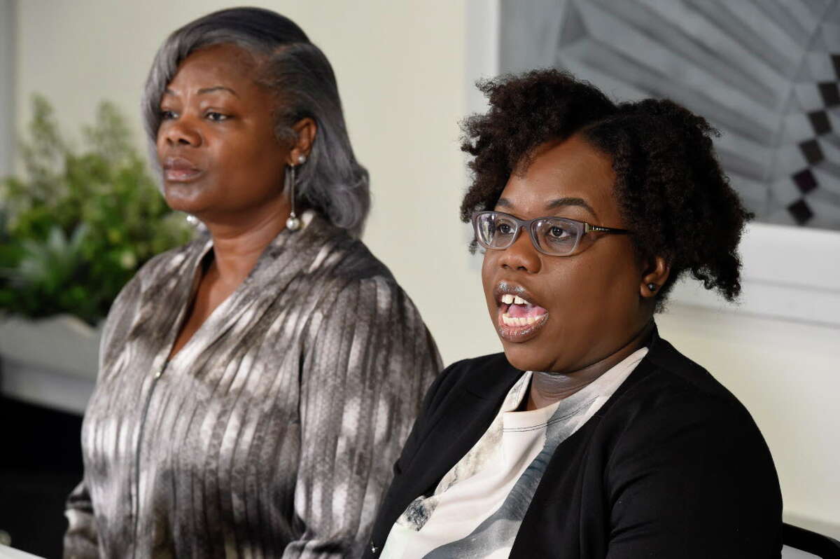 Gertha DePas, mother of Edson Thevenin who was shot by Troy Police Sgt. French, left is joined by her daughter in law Cinthia Thevenin as they spoke to the media during a press conference April 28, 2016 at the Empire Christian Center in Albany, N.Y. (Skip Dickstein/Times Union)