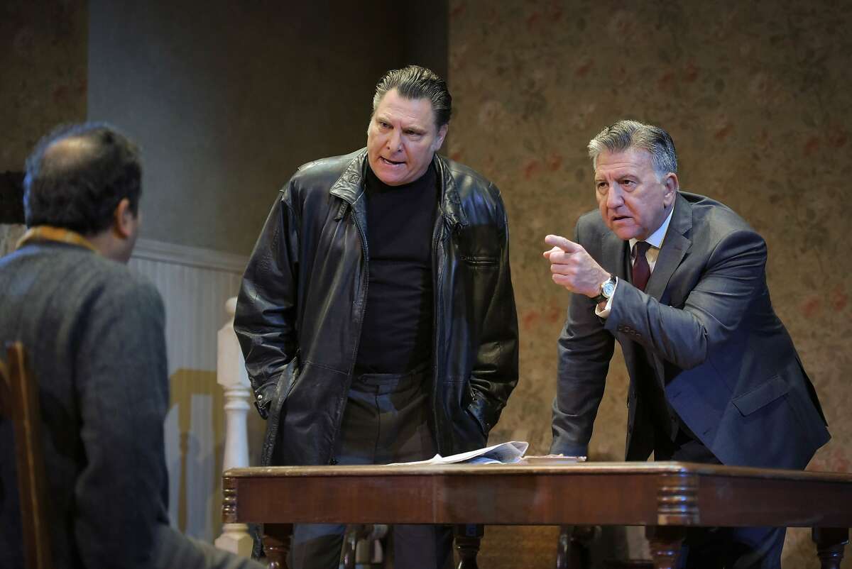 McCann (Marco Barricelli, center) and Goldberg (Scott Wentworth, right) interrogate Stanley (Firdous Bamji, left) in ACT's "The Birthday Party."