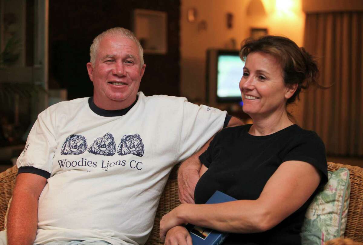 FILE - In this Oct. 16, 2009, file photo, shows Senior Zimbabwean MDC opposition official Roy Bennett, left, and his wife Heather, relax at a friends home in Mutare about 200 km east of Harare, Zimbabwe, following his release from prison. A fiery helicopter crash killed Bennett and his wife, while on holiday in a remote part of the U.S. state of New Mexico, authorities said Thursday, Jan. 18, 2018.