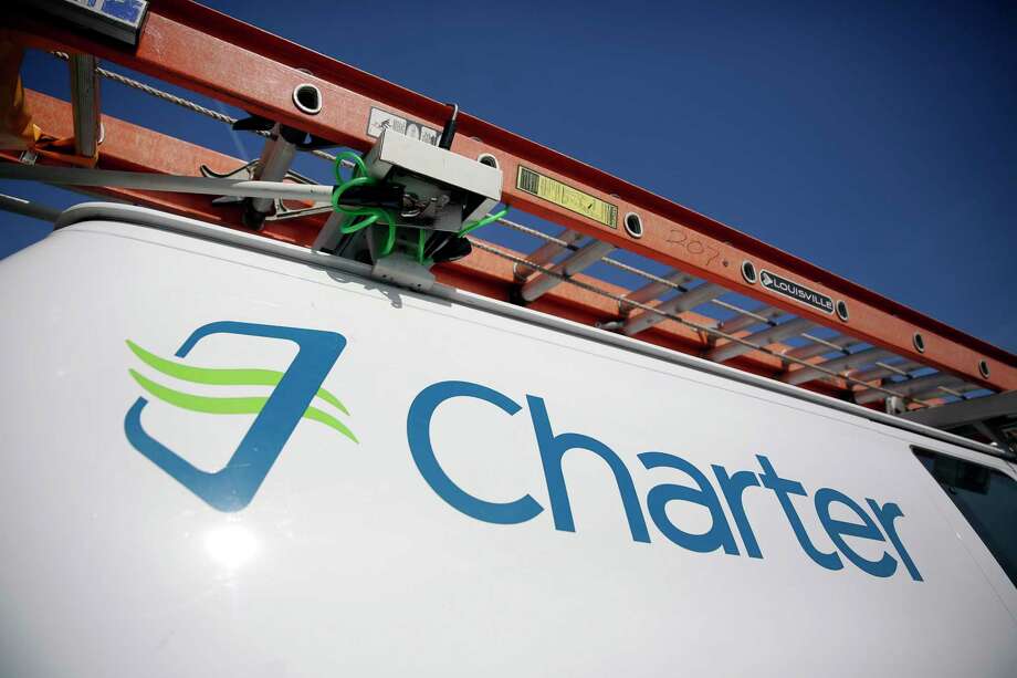 FILE - This April 1, 2015, file photo, shows a Charter Communications van in St. Louis. Now that federal telecom regulators have repealed net neutrality, it may be time to brace for the arrival of internet fast lanes and slow lanes. The Associated Press queried seven major internet providers about their post-net-neutrality plans, and all of them equivocated when asked if they might establish fast and slow lanes. (AP Photo/Jeff Roberson, File) ORG XMIT: NYBZ359 Photo: Jeff Roberson / Copyright 2016 The Associated Press. All rights reserved. This m
