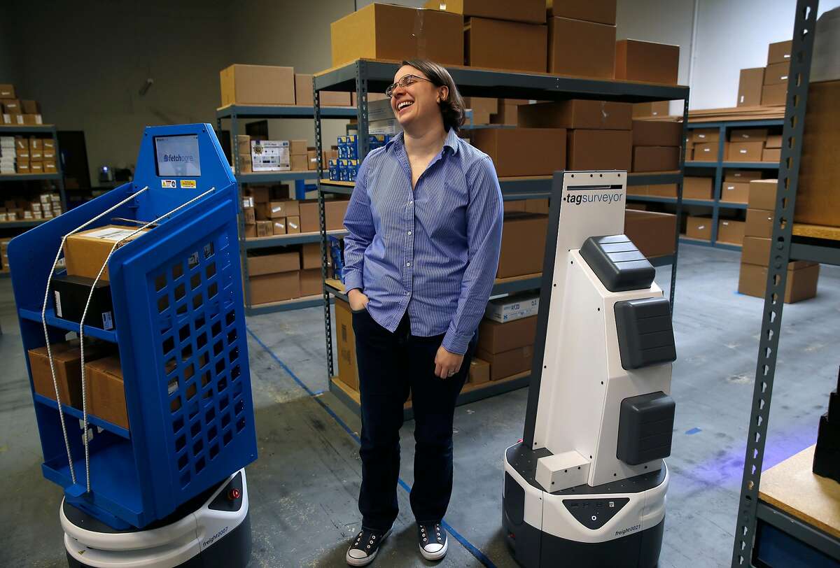 Fetch Robotics CEO Melonee Wise visits with autonomous mobile robots at the testing facility in San Jose, Calif. on Friday, Dec. 8, 2017.
