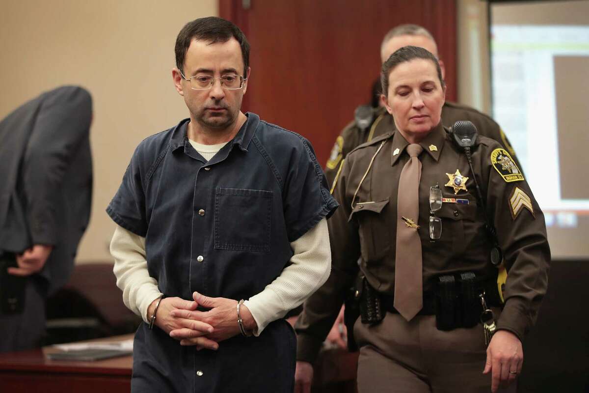 LANSING, MI - JANUARY 16: Larry Nassar appears in court to listen to victim impact statements prior to being sentenced after being accused of molesting about 100 girls while he was a physician for USA Gymnastics and Michigan State University, where he had his sports-medicine practice on January 16, 2018 in Lansing, Michigan. Nassar has pleaded guilty in Ingham County, Michigan, to sexually assaulting seven girls, but the judge is allowing all his accusers to speak. Nassar is currently serving a 60-year sentence in federal prison for possession of child pornography. (Photo by Scott Olson/Getty Images)