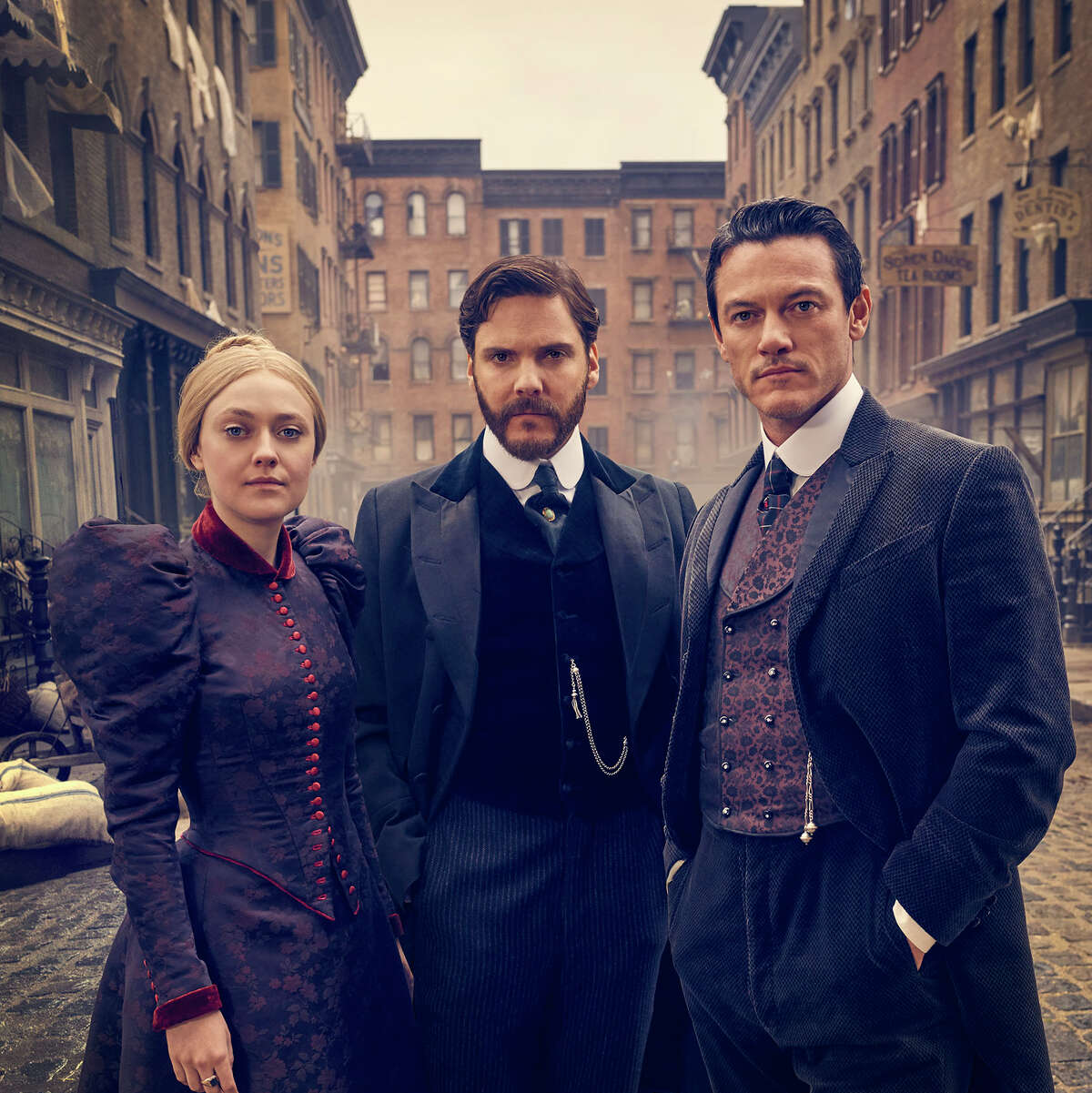 "The Alienist" takes viewers back to 19th-century New York and stars Dakota Fanning, from left, Daniel Brühl and Luke Evans as unlikely gumshoes determined to track down a diabolical killer of young boy prostitutes.