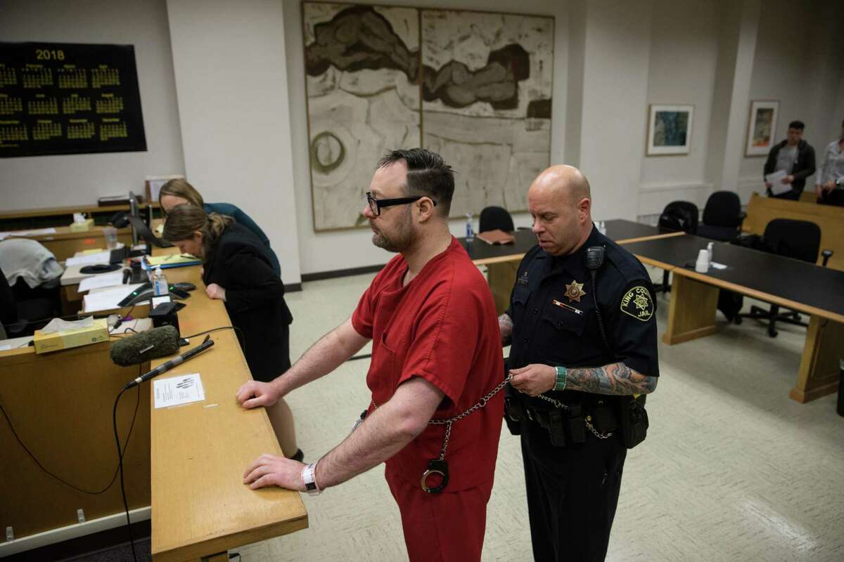 Michael-Jon "Matt" Hickey is put back into handcuffs following his sentencing at King County Courthouse on Friday, Jan. 19, 2018.