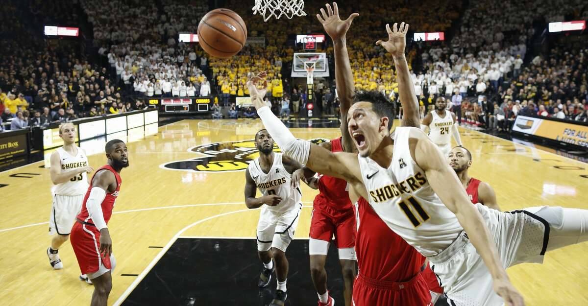 Wichita State's Landry Shamet (11) takes a shot and is fouled against Houston during the second half at Koch Arena on Thursday, Jan. 4, 2018. The host Shockers won, 81-63. (Travis Heying/Wichita Eagle/TNS)