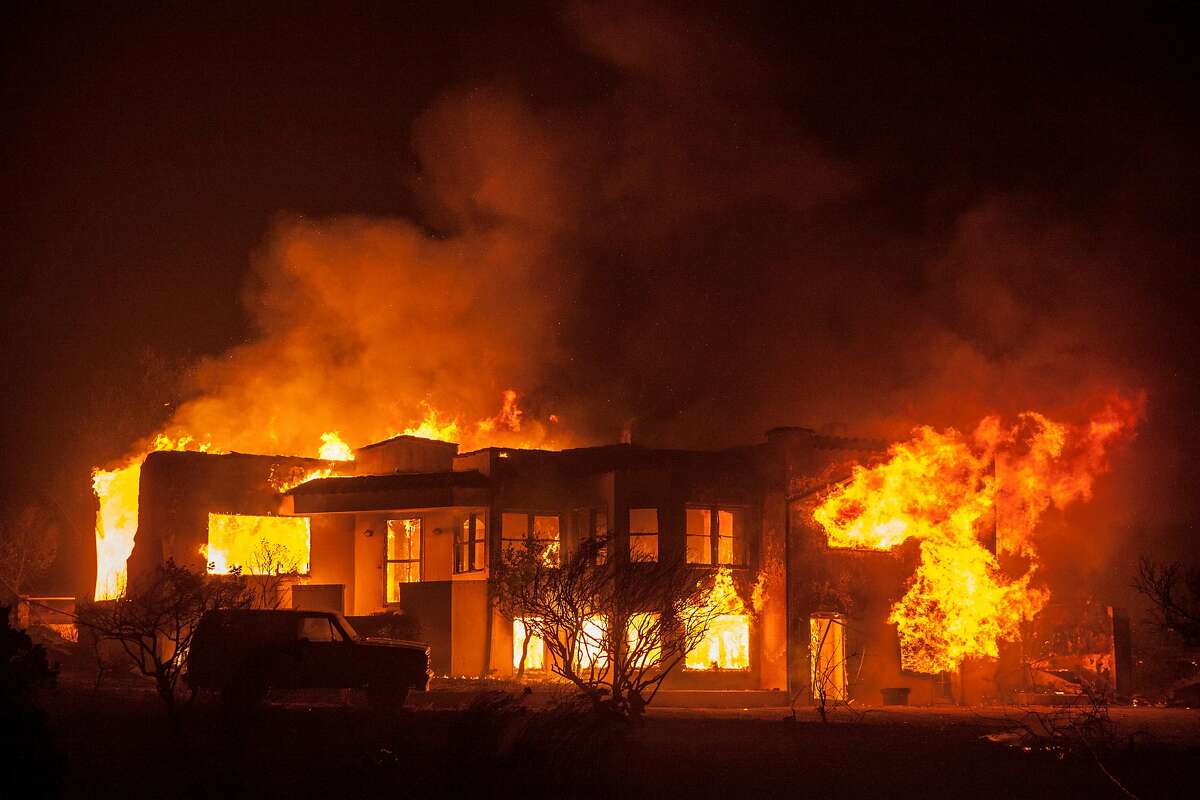 A ranch home along Hwy. 12 burned out of control as a fast moving wind whipped wild fire raged though the Napa/Sonoma wine region in NAPA, CALIFORNIA, USA 9 Oct 2017. Multiple fire have erupted in Napa, Sonoma, Calistoga and the Santa Rosa area, burning homes and wineries. Mandatory evacuations have be displaced hundreds of residents through out the area.