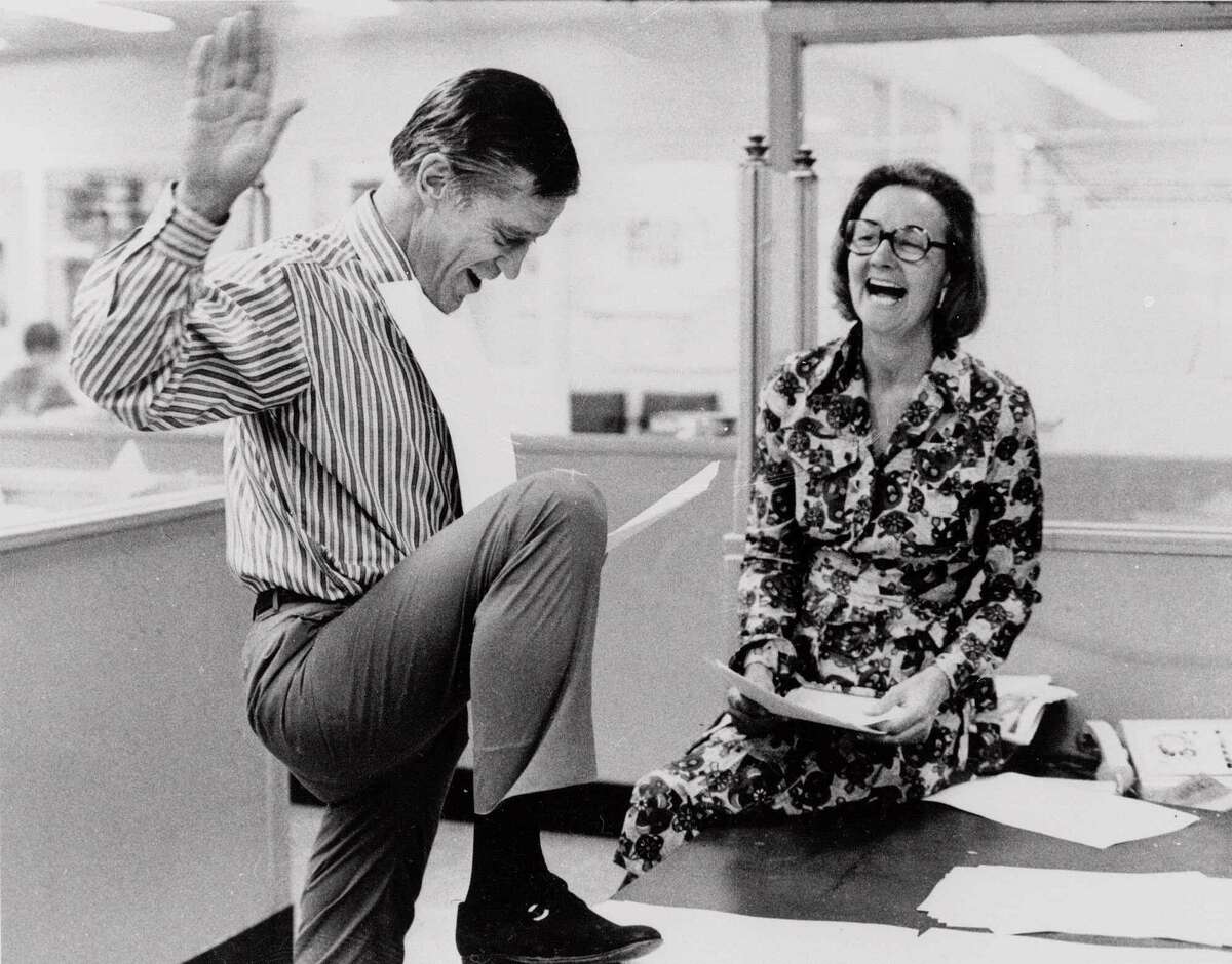 Katharine Graham, then publisher of the Washington Post, and Executive Editor Benjamin Bradlee look over reports of the 6-3 Supreme Court decision which permitted the paper to publish stories based on the secret Pentagon study of the Vietnam War, in this June 30, 1971 file photo.