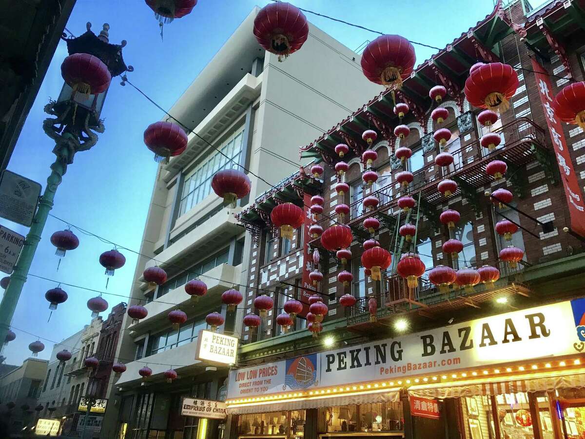 The high-rise building on Grant Avenue (left) has been empty since the Empress of China restaurant closed in 2014 in San Francisco’s Chinatown.