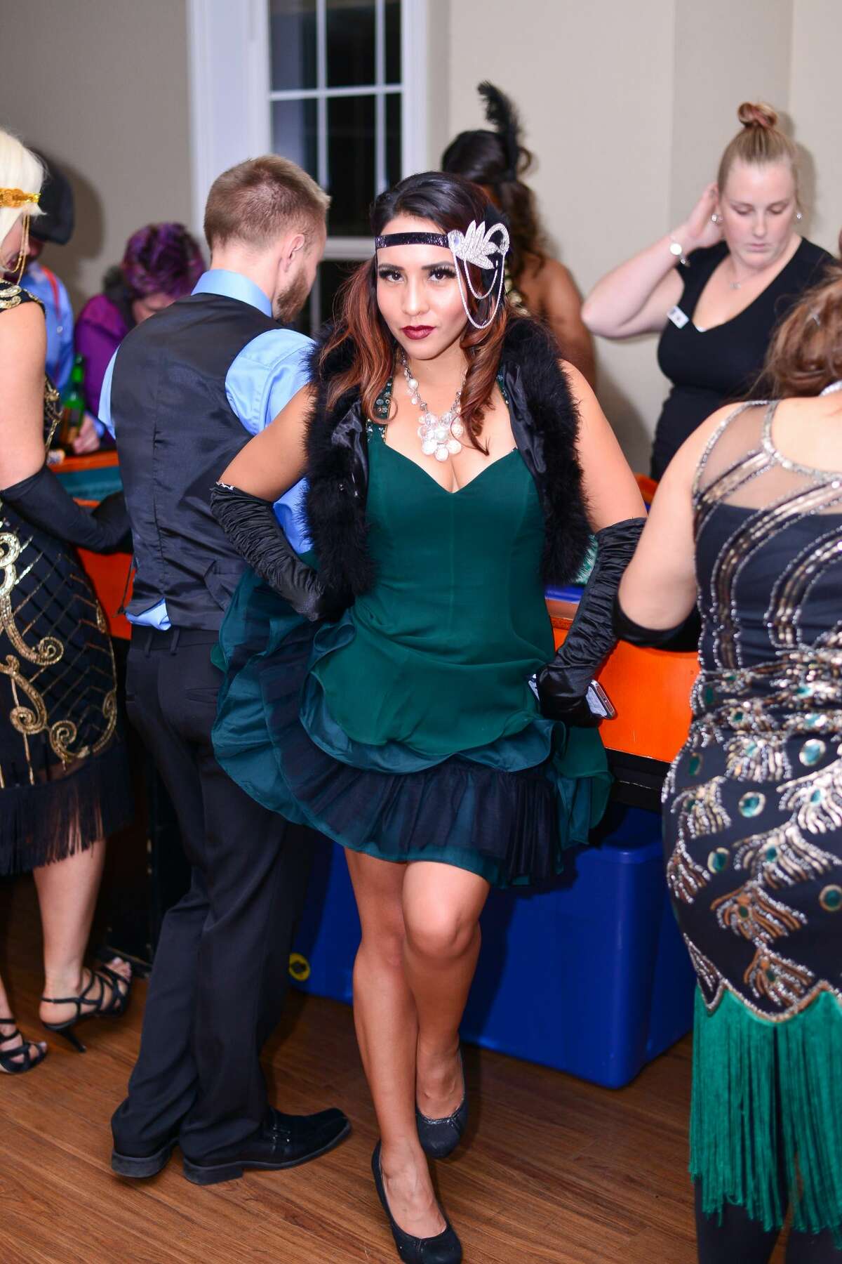 The Étonnant Fleur's Great Gatsby Roaring '20s party Friday night, Jan. 20, 2018, helped raise money to benefit area women veterans while flaunting a bit of ritzy style.