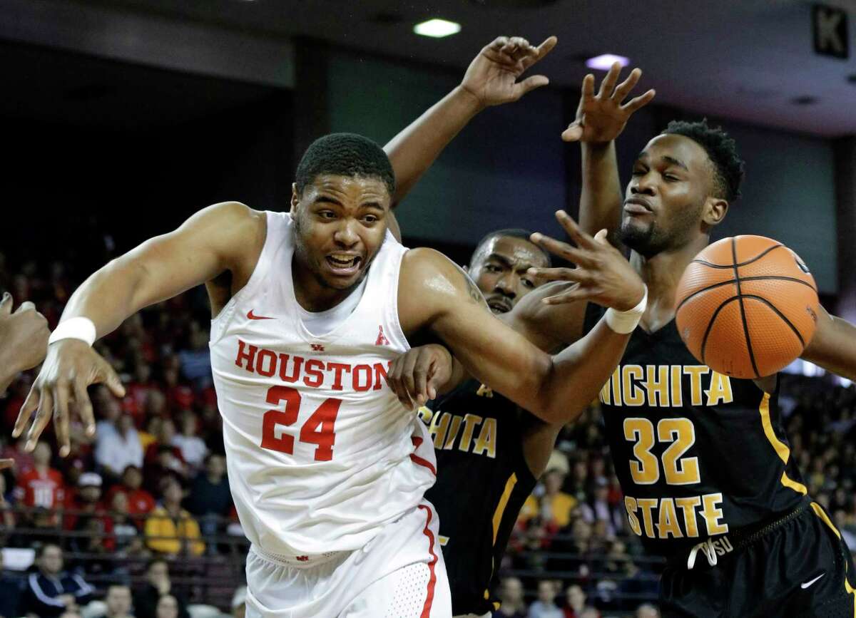 Houston forward Breaon Brady (24) loses a rebound under pressure from Wichita State forward Rashard Kelly (0) and forward Markis McDuffie (32) during the first half of their game at H&PE Arena at Texas State University Saturday, Jan. 20, 2018, in Houston, TX. (Michael Wyke / For the Chronicle)