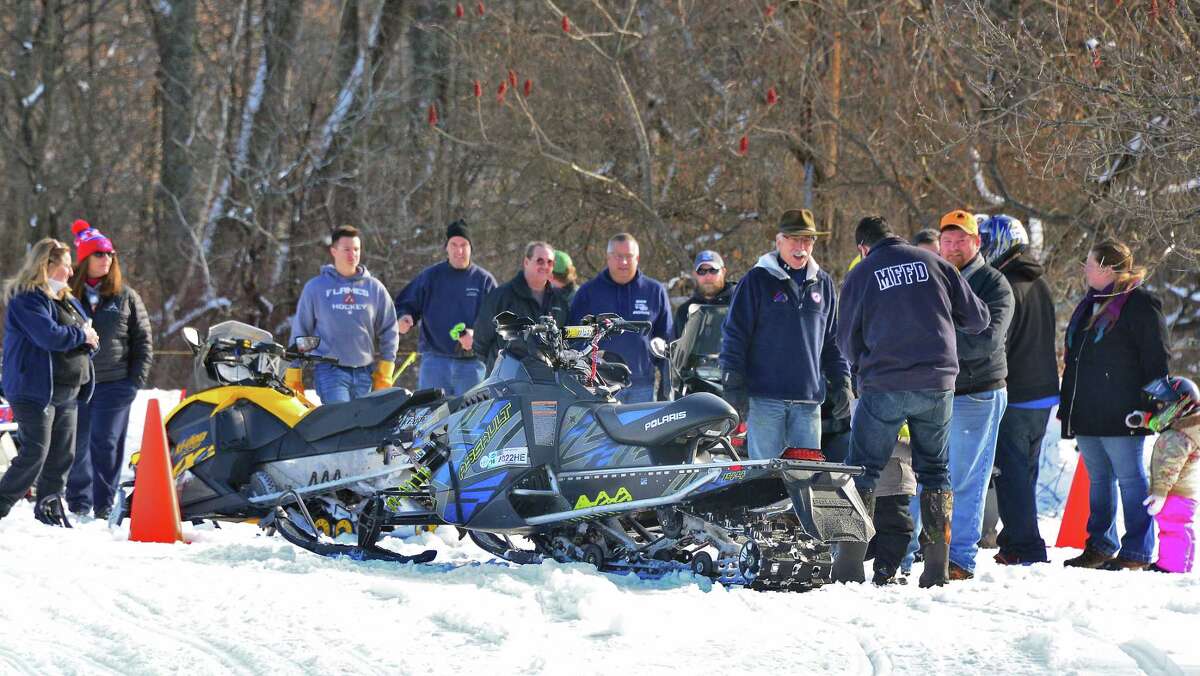 Photos Snowmobilers, friends seize the moment
