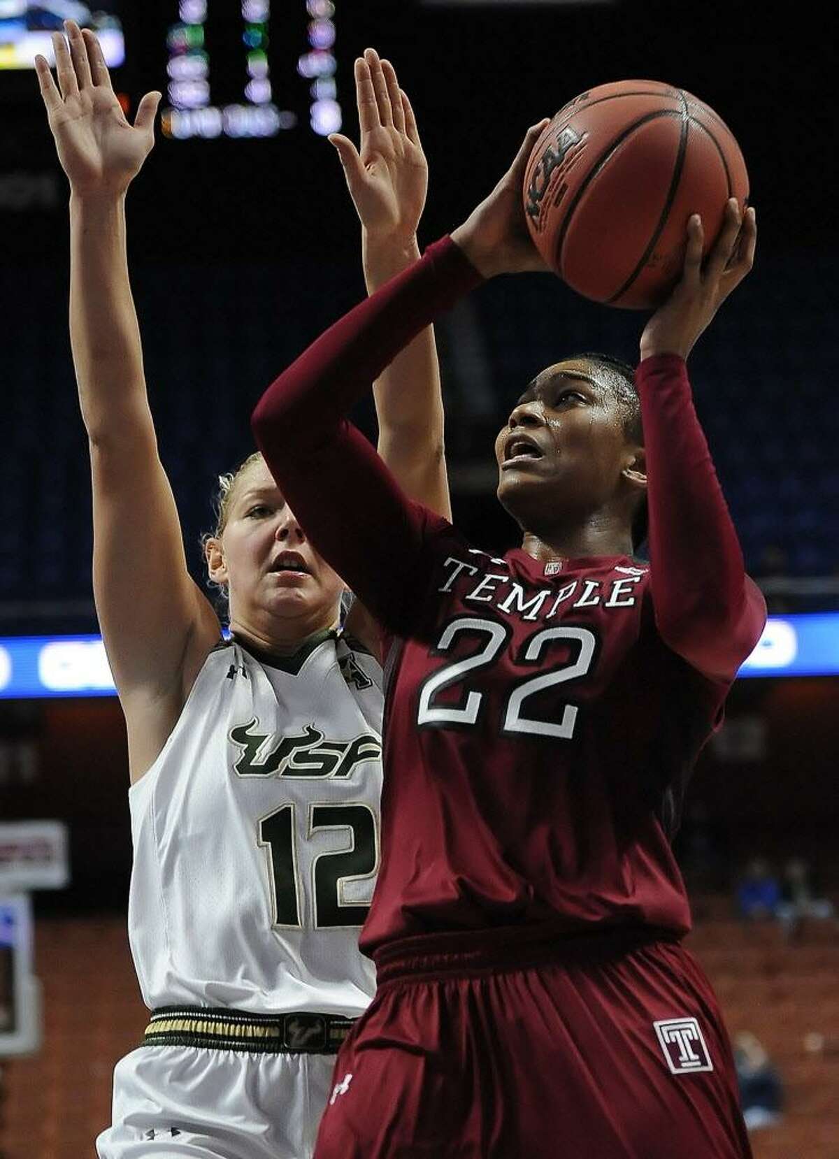 Temple’s Tanaya Atkinson, right, shoots as South Florida’s Maria Jespersen defends during an American Athletic Conference tournament semifinal game at Mohegan Sun Arena on March 6, 2016 in Uncasville.